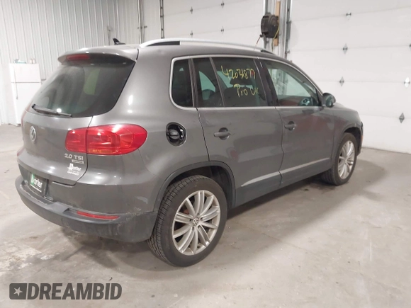 2012 Volkswagen Tiguan S with VIN WVGBV7AX2CW002991, listed as a IAAI auction lot 42031877 with 205,979 mi miles and . Bid and sale history available at DreamBid. Image 4.