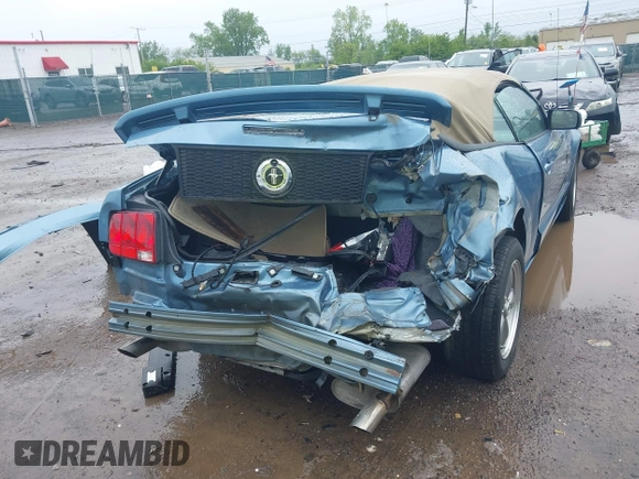 2005 Ford Mustang Deluxe z VIN 1ZVFT84N655195289, wystawiony jako IAAI lot #42182596 z przebiegiem 84 205 mil mil oraz . Historia ofert i sprzedaży dostępna na DreamBid. Obrazek 17.