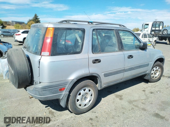 2001 Honda CR-V LX with VIN JHLRD18431C013465, listed as a Copart auction lot 73684654 with 98,165 mi miles and Salvage Title. Bid and sale history available at carsss.com. Image 3.