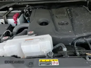 2025 Toyota Tundra SR5 z VIN 5TFWA5DB0SX303032, wystawiony jako Copart lot #64770295 z przebiegiem 2 056 mil mil oraz Szkoda całkowita • Salvage title. Historia ofert i sprzedaży dostępna na DreamBid. Obrazek 13.