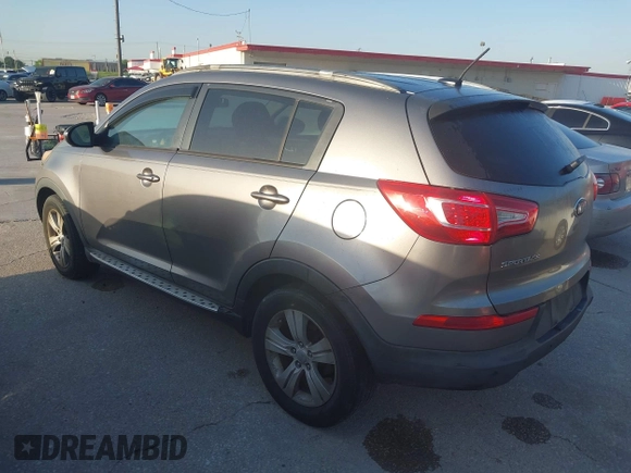 2013 Kia Sportage LX z VIN KNDPB3A26D7406680, wystawiony jako IAAI lot #42004413 z przebiegiem 170 221 mil mil oraz . Historia ofert i sprzedaży dostępna na DreamBid. Obrazek 3.