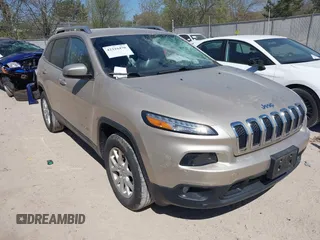 2014 Jeep Cherokee Latitude z VIN 1C4PJMCS3EW197492, wystawiony jako IAAI lot #42216470 z przebiegiem 125 156 mil mil oraz . Historia ofert i sprzedaży dostępna na DreamBid. Obrazek 1.