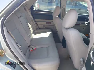 2006 Chrysler 300 C with VIN 2C3LA63H26H130160, listed as a IAAI auction lot 42170192 with 124,206 mi miles. Bid and sale history available at carsss.com. Image 8.