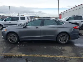 2014 Ford Fusion Titanium with VIN 3FA6P0K9XER271369, listed as a IAAI auction lot 41622854 with 187,471 mi miles. Bid and sale history available at carsss.com. Image 14.