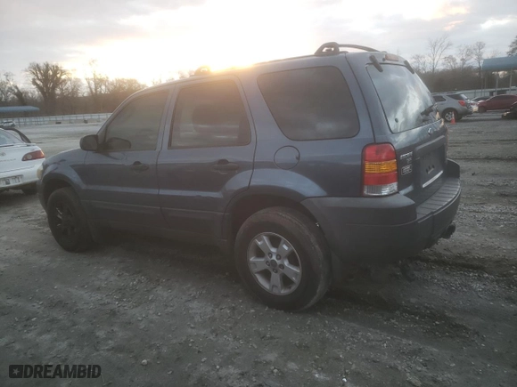 2005 Ford Escape XLT with VIN 1FMCU031X5KA51812, listed as a Copart auction lot 47661045 with 244,572 mi miles and Salvage Title. Bid and sale history available at carsss.com. Image 2.