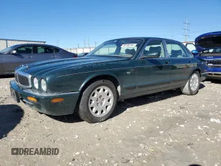 2001 Jaguar XJ with VIN SAJDA14CX1LF26357, listed as a Copart auction lot 80168144 with 82,512 mi miles and Clean Title. Bid and sale history available at carsss.com. Image 1.