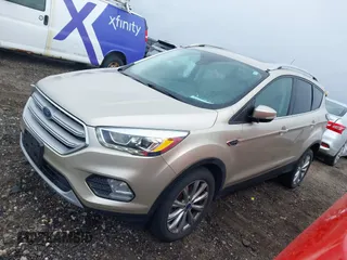 2017 Ford Escape Titanium with VIN 1FMCU9JD1HUB05881, listed as a IAAI auction lot 41966842 with 185,963 mi miles. Bid and sale history available at carsss.com. Image 17.