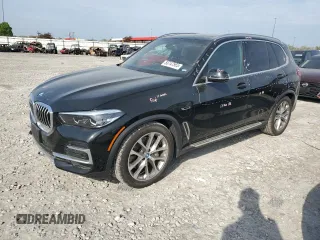 2023 BMW X5 xDrive45e z VIN 5UXTA6C03P9P26996, wystawiony jako Copart lot #53747565 z przebiegiem 52 599 mil mil oraz Szkoda całkowita • Salvage title. Historia ofert i sprzedaży dostępna na DreamBid. Obrazek 1.