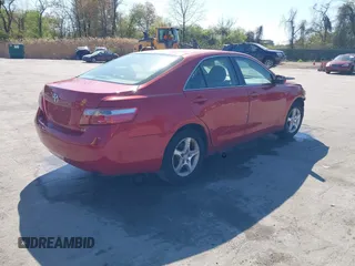 2007 Toyota Camry CE with VIN JTNBE46K073031988, listed as a IAAI auction lot 42062321 with 238,925 mi miles. Bid and sale history available at carsss.com. Image 4.