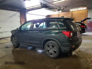 2020 Honda Passport EX-L with VIN 5FNYF8H57LB011549, listed as a Copart auction lot 59123735 with 127,797 mi miles and Salvage title. Bid and sale history available at DreamBid. Image 2.