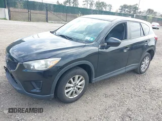 2014 Mazda CX-5 Sport with VIN JM3KE4BE4E0426931, listed as a IAAI auction lot 42055582 with 121,418 mi miles. Bid and sale history available at carsss.com. Image 18.