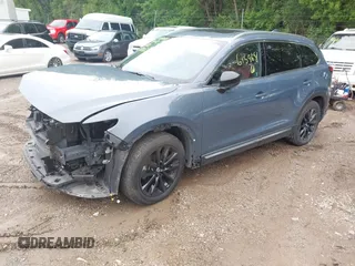 2022 Mazda CX-9 Grand Touring with VIN JM3TCBDY0N0615968, listed as a IAAI auction lot 42312159 with 22,912 mi miles and . Bid and sale history available at DreamBid. Image 19.