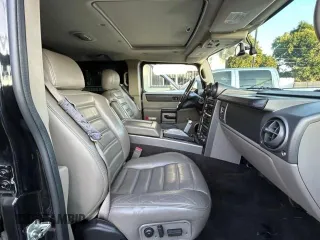 2003 Hummer H2 with VIN 5GRGN23U23H145183, listed as a Copart auction lot 84566884 with 85,945 mi miles and Clean Title. Bid and sale history available at carsss.com. Image 5.