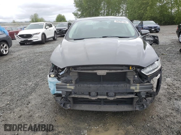 2015 Ford Fusion SE z VIN 3FA6P0H95FR206535, wystawiony jako Copart lot #54242105 z przebiegiem 83 001 mil mil oraz Szkoda całkowita • Salvage title. Historia ofert i sprzedaży dostępna na DreamBid. Obrazek 5.