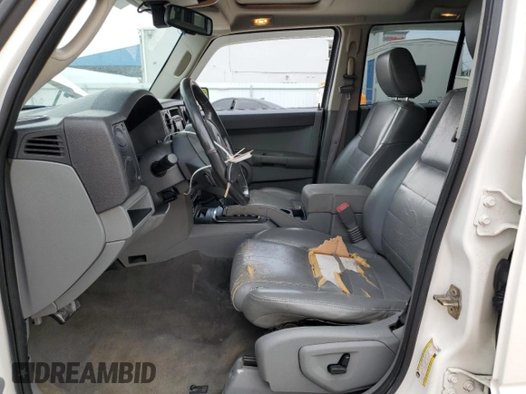 2006 Jeep Commander with VIN 1J8HH48N06C352871, listed as a Copart auction lot 87740115 with 163,703 mi miles and Salvage Title. Bid and sale history available at carsss.com. Image 7.