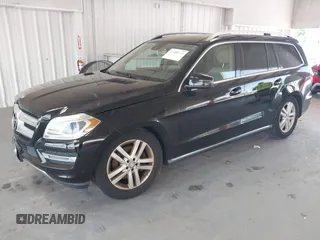 2014 Mercedes-Benz GL 450 z VIN 4JGDF7CE7EA435479, wystawiony jako IAAI lot #42280243 z przebiegiem 138 930 mil mil oraz . Historia ofert i sprzedaży dostępna na DreamBid. Obrazek 17.