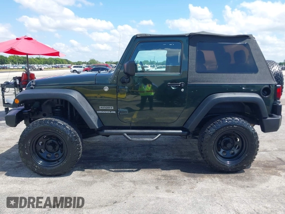 2010 Jeep Wrangler Sport with VIN 1J4AA2D17AL126737, listed as a IAAI auction lot 42237596 with 119,391 mi miles and . Bid and sale history available at carsss.com. Image 14.