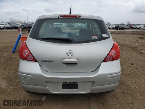 2009 Nissan Versa S with VIN 3N1BC13E79L465505, listed as a Copart auction lot 52097865 with 90,774 mi miles and Salvage Title. Bid and sale history available at DreamBid. Image 6.