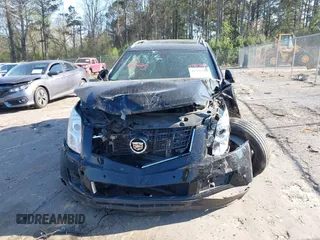 2016 Cadillac SRX Luxury Collection with VIN 3GYFNBE31GS544322, listed as a IAAI auction lot 41855688 with 128,934 mi miles. Bid and sale history available at carsss.com. Image 12.