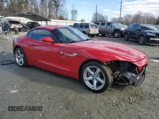 2014 BMW Z4 sDrive28i with VIN WBALL5C57EP556519, listed as a Copart auction lot 88090055 with 124,767 mi miles and Salvage Title. Bid and sale history available at carsss.com. Image 4.