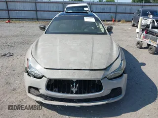 2015 Maserati Ghibli S Q4 with VIN ZAM57RTA7F1138207, listed as a IAAI auction lot 42573567 with Not provided miles and . Bid and sale history available at DreamBid. Image 12.