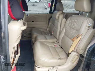 2007 Honda Odyssey Touring z VIN 5FNRL38827B059573, wystawiony jako IAAI lot #42261125 z przebiegiem 214 954 mil mil oraz . Historia ofert i sprzedaży dostępna na DreamBid. Obrazek 8.