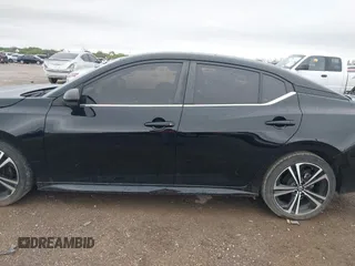 2021 Nissan Sentra SR z VIN 3N1AB8DV8MY306722, wystawiony jako IAAI lot #41954174 z przebiegiem 73 473 mil mil oraz . Historia ofert i sprzedaży dostępna na DreamBid. Obrazek 14.