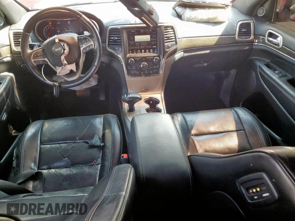 2015 Jeep Grand Cherokee Overland with VIN 1C4RJECG3FC686536, listed as a Copart auction lot 61058215 with 132,282 mi miles and Salvage title. Bid and sale history available at DreamBid. Image 8.