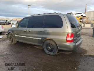 2003 Kia Sedona LX with VIN KNDUP131636359281, listed as a Copart auction lot 81978154 with 180,813 mi miles and Salvage Title. Bid and sale history available at carsss.com. Image 2.