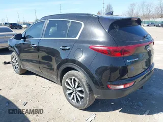 2018 Kia Sportage EX with VIN KNDPNCAC9J7324292, listed as a IAAI auction lot 41859338 with 124,519 mi miles and . Bid and sale history available at carsss.com. Image 3.
