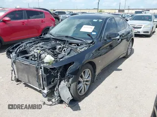 2014 Infiniti Q50 Premium z VIN JN1BV7AP2EM673289, wystawiony jako IAAI lot #42552398 z przebiegiem 172 770 mil mil oraz . Historia ofert i sprzedaży dostępna na DreamBid. Obrazek 2.