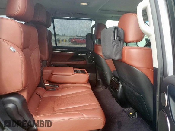 2017 Lexus LX 570 with VIN JTJHY7AX6H4237898, listed as a Copart auction lot 61805495 with 97,598 mi miles and Salvage title. Bid and sale history available at DreamBid. Image 11.