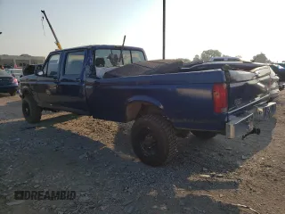 1997 Ford F-350 with VIN 1FTJW36F0VEC59307, listed as a Copart auction lot 62430515 with 199,894 mi miles and Salvage title. Bid and sale history available at DreamBid. Image 2.