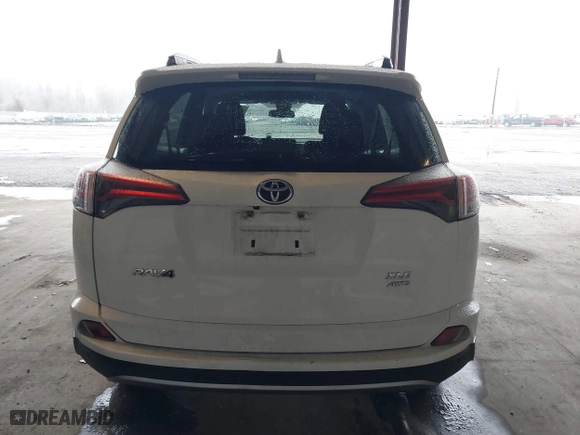 2018 Toyota RAV4 XLE with VIN JTMRFREV6JD222115, listed as a IAAI auction lot 41505367 with 118,126 mi miles. Bid and sale history available at carsss.com. Image 16.
