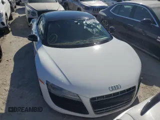 2011 Audi R8 5.2L z VIN WUAANAFG8BN000143, wystawiony jako Copart lot #74799504 z przebiegiem Nie podano mil oraz Szkoda całkowita • Salvage title. Historia ofert i sprzedaży dostępna na DreamBid. Obrazek 5.