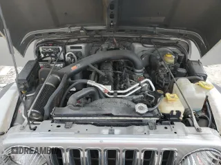 2000 Jeep Wrangler Sport with VIN 1J4FA49S4YP789348, listed as a Copart auction lot 50521365 with 0 mi miles and Salvage Title. Bid and sale history available at carsss.com. Image 12.