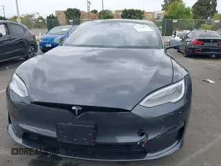2021 Tesla Model S Long Range с VIN 5YJSA1E57MF441387, выставлен на аукционе IAAI как лот 42034307 с пробегом Не указан миль и . История ставок и продаж доступна на DreamBid. Изображение 12.