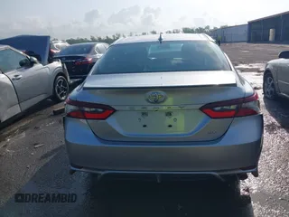 2021 Toyota Camry SE Nightshade with VIN 4T1G11AKXMU599663, listed as a IAAI auction lot 41902392 with 76,909 mi miles. Bid and sale history available at carsss.com. Image 16.