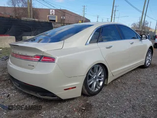2015 Lincoln MKZ with VIN 3LN6L2G94FR602163, listed as a IAAI auction lot 41889160 with 89,909 mi miles and . Bid and sale history available at DreamBid. Image 4.