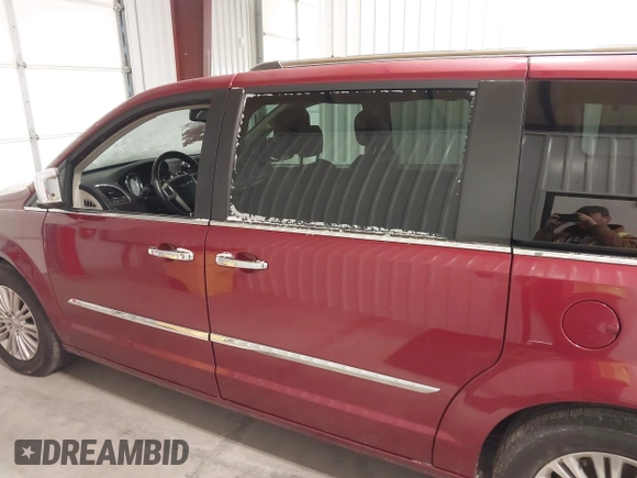 2015 Chrysler Town & Country Limited Platinum with VIN 2C4RC1GGXFR597180, listed as a IAAI auction lot 41374817 with 90,088 mi miles and . Bid and sale history available at DreamBid. Image 14.