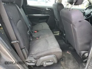 2013 Dodge Journey SE z VIN 3C4PDCAB0DT728950, wystawiony jako Copart lot #57525305 z przebiegiem 181 414 mil mil oraz Czysty tytuł • Clean title. Historia ofert i sprzedaży dostępna na DreamBid. Obrazek 11.