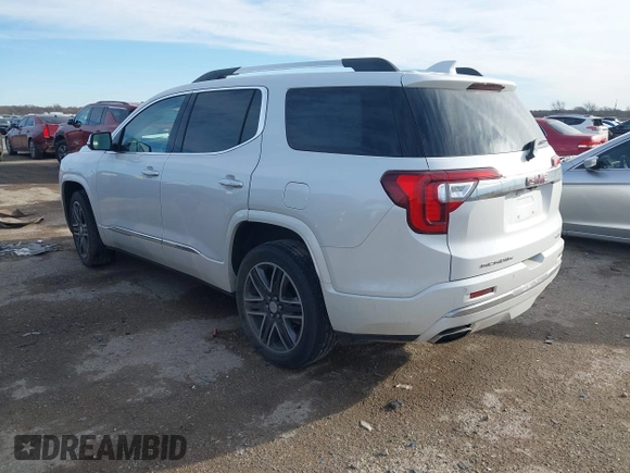 2020 GMC Acadia Denali with VIN 1GKKNXLS8LZ121704, listed as a IAAI auction lot 41665662 with 69,937 mi miles. Bid and sale history available at carsss.com. Image 3.