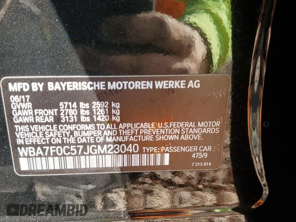 2018 BMW 7 Series 750i with VIN WBA7F0C57JGM23040, listed as a Copart auction lot 87392704 with 0 mi miles and Salvage Title. Bid and sale history available at carsss.com. Image 12.