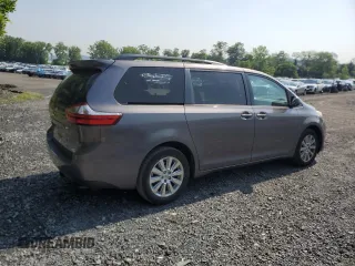 2015 Toyota Sienna LE with VIN 5TDJK3DC0FS112243, listed as a Copart auction lot 61791405 with 86,039 mi miles and Salvage title. Bid and sale history available at DreamBid. Image 3.