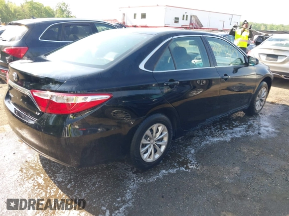 2015 Toyota Camry XLE with VIN 4T4BF1FKXFR479536, listed as a IAAI auction lot 42147724 with 88,853 mi miles and . Bid and sale history available at DreamBid. Image 4.