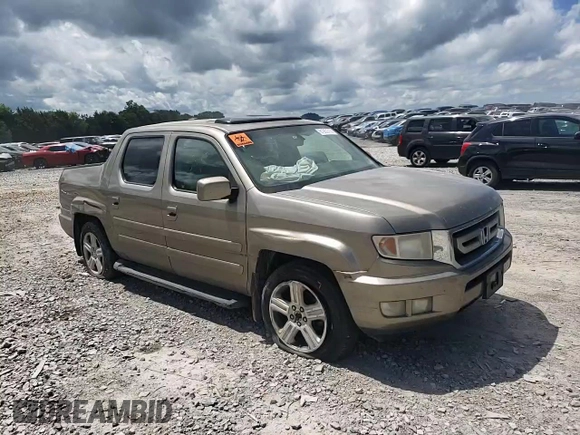 2011 Honda Ridgeline RTL with VIN 5FPYK1F59BB007045, listed as a Copart auction lot 61263715 with 159,527 mi miles and Clean title. Bid and sale history available at DreamBid. Image 14.