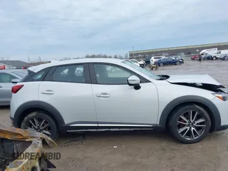 2016 Mazda CX-3 Grand Touring with VIN JM1DKFD76G0134205, listed as a IAAI auction lot 41661904 with 190,368 mi miles. Bid and sale history available at carsss.com. Image 13.
