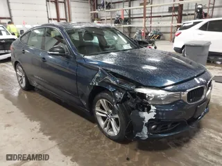 2014 BMW 3 Series Gran Turismo 328i xDrive with VIN WBA3X5C5XED557668, listed as a IAAI auction lot 41728522 with 123,393 mi miles. Bid and sale history available at carsss.com. Image 1.