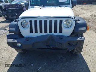 2020 Jeep Wrangler Unlimited Sport S with VIN 1C4HJXDG9LW229715, listed as a IAAI auction lot 42203008 with 63,683 mi miles and . Bid and sale history available at DreamBid. Image 6.