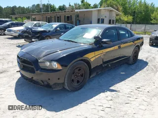 2014 Dodge Charger Police with VIN 2C3CDXAT1EH367015, listed as a IAAI auction lot 42136195 with 121,536 mi miles and . Bid and sale history available at DreamBid. Image 17.